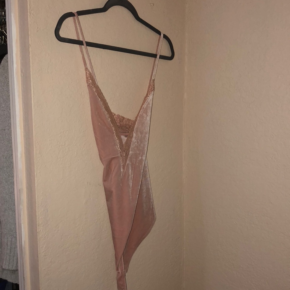 Pink body suit